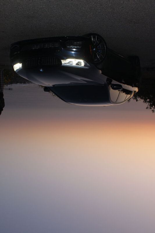 540i silhouette against a California sunset
